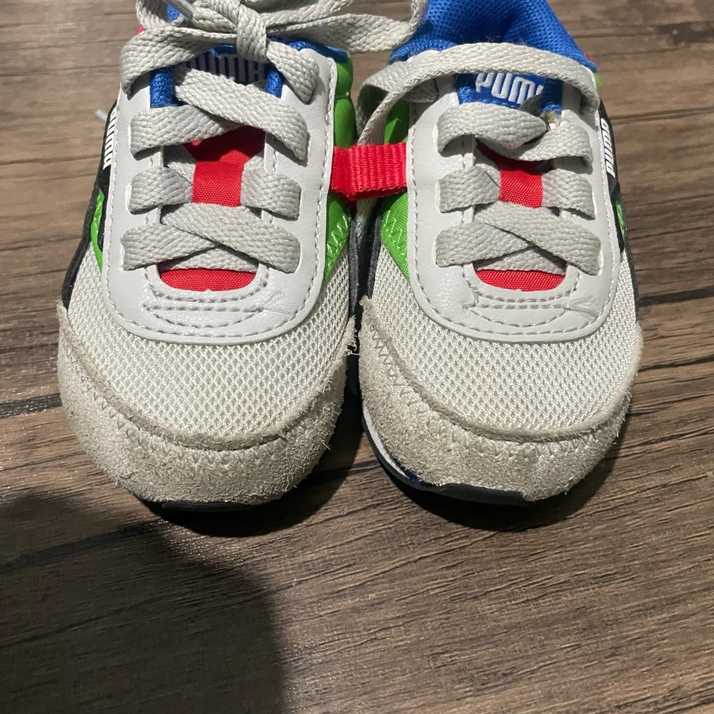 Preowned multi colored Puma toddler  size 5c